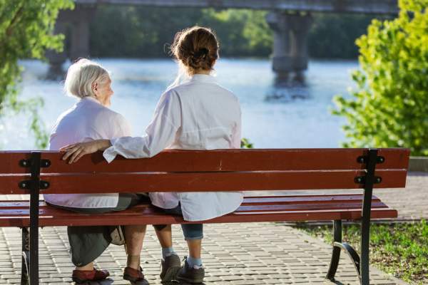 Carer with her care recipient in the park