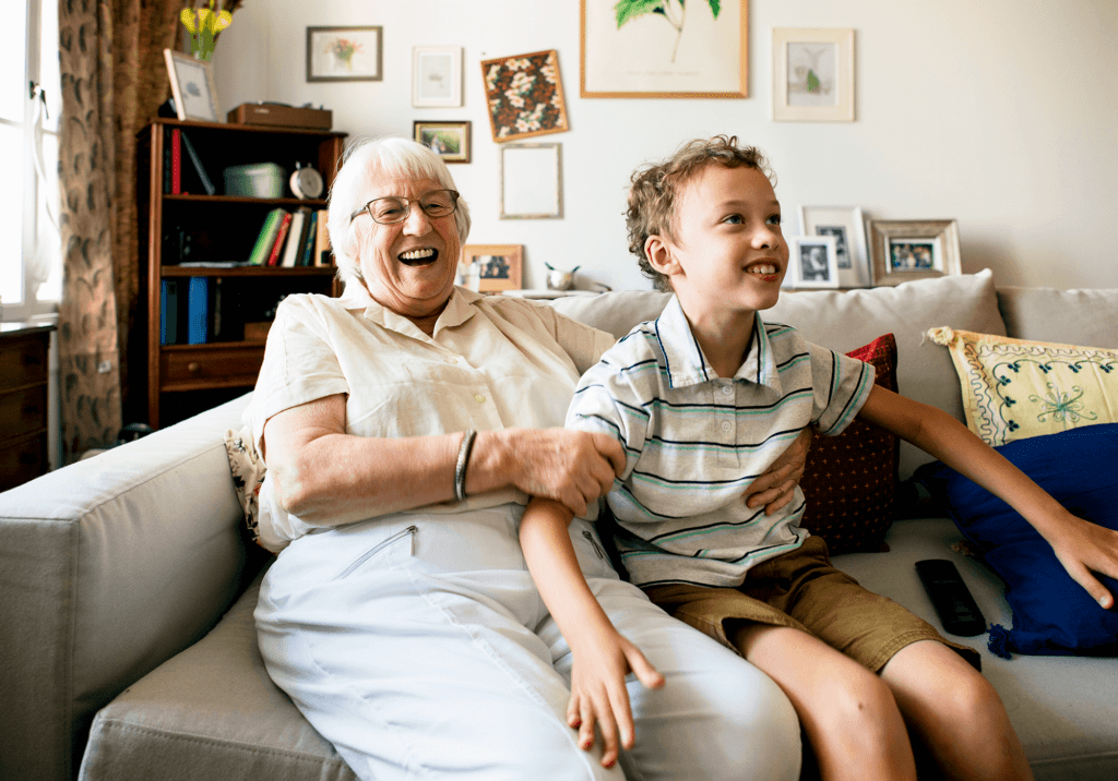 grandma-and-grandson-sitting-on-the-sofa-together