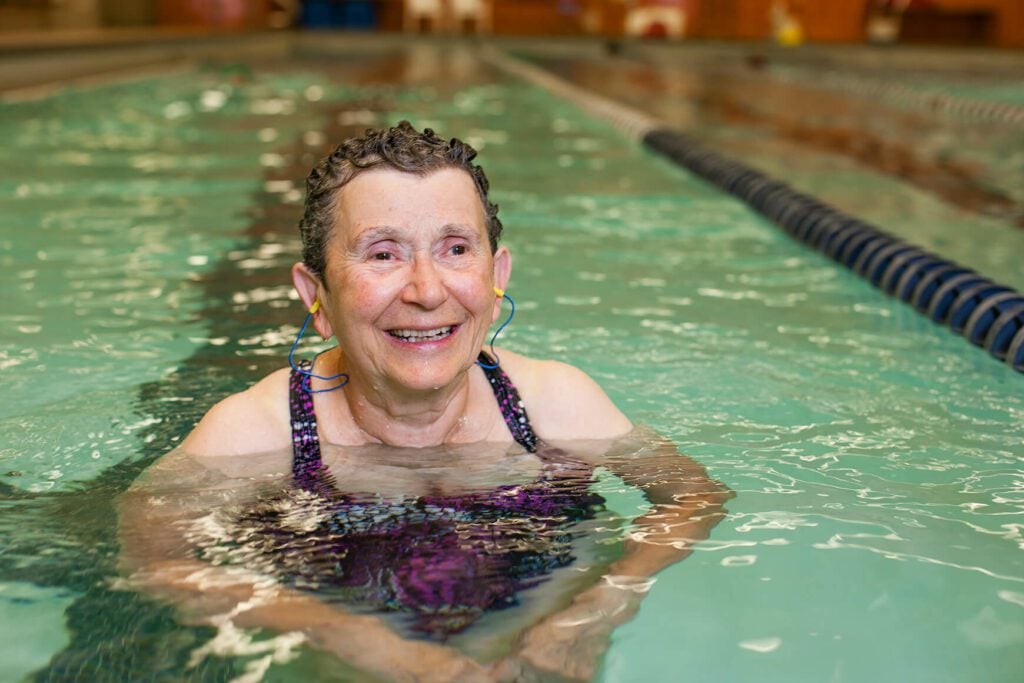 An Older Lady Swimming in a Local Leisure Centre