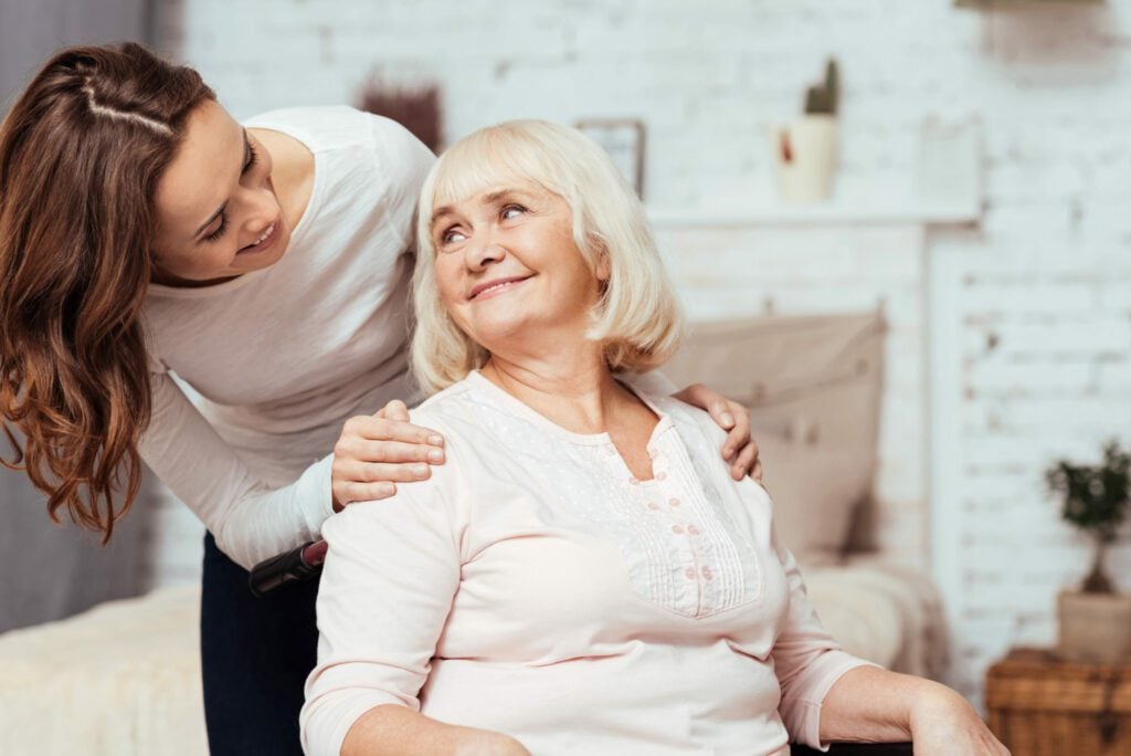 Carer with elderly woman in the house